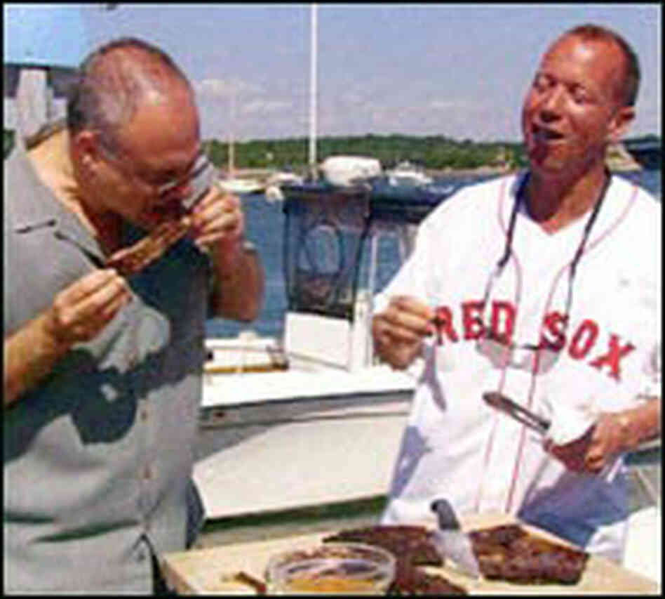 Mark Bittman, left, and Chris Schlesinger chew over Schlesinger's slow-grilled ribs. Mark Bittman, left, and Chris Schlesinger chew over Schlesinger's slow-grilled ribs.