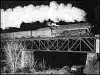A Class J crosses a bridge over the New River at Radford, Va. A Class J crosses a bridge over the New River at Radford, Va.
