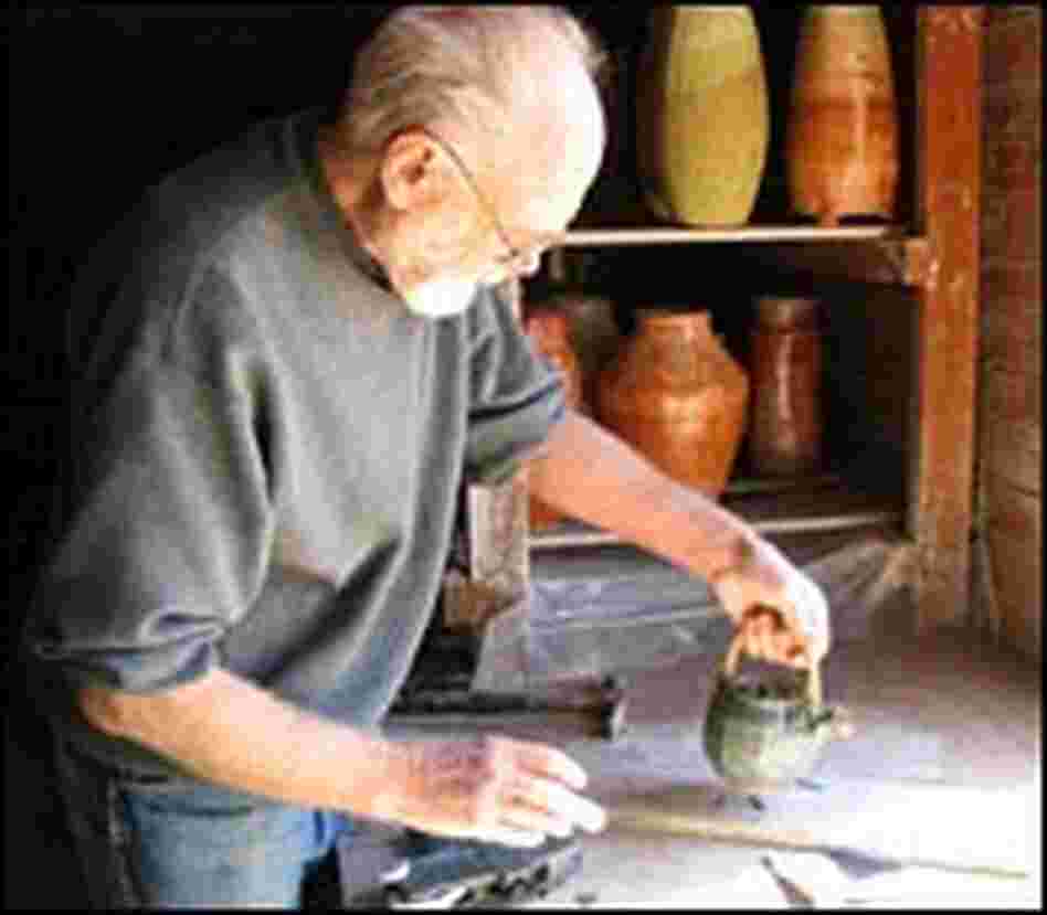 Warren MacKenzie at work in his studio. Warren MacKenzie at work in his studio.
