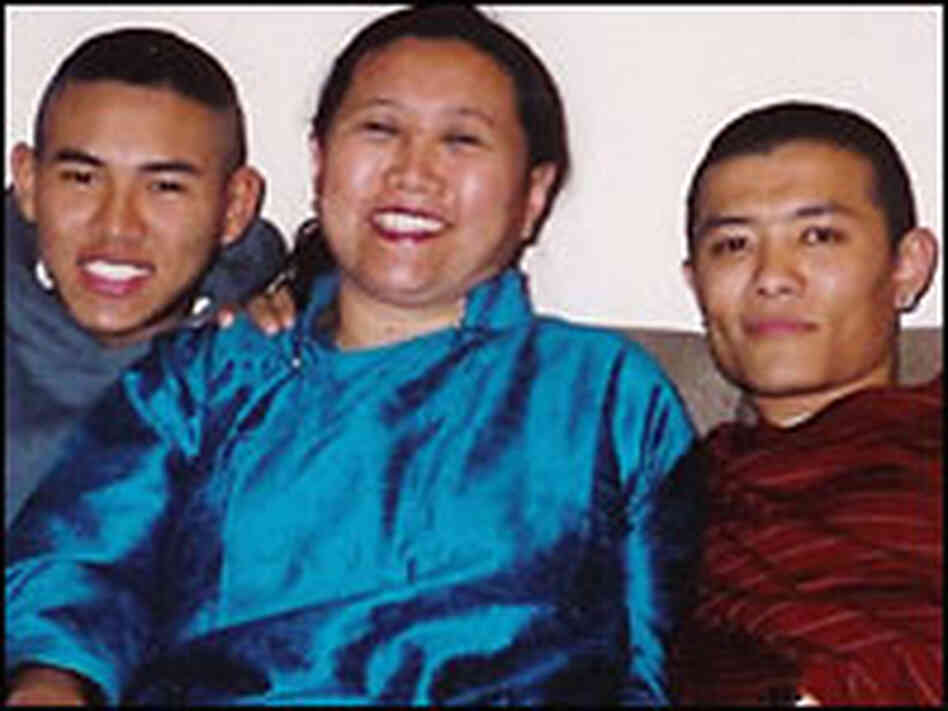 Tenzin Dengkhim, pictured with his mother and older brother, Tenzin Dengkhim, pictured with his mother and older brother,