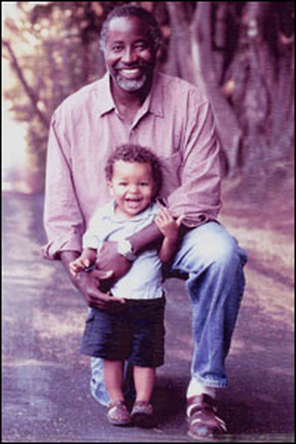 John Francis with his son. John Francis with his son.