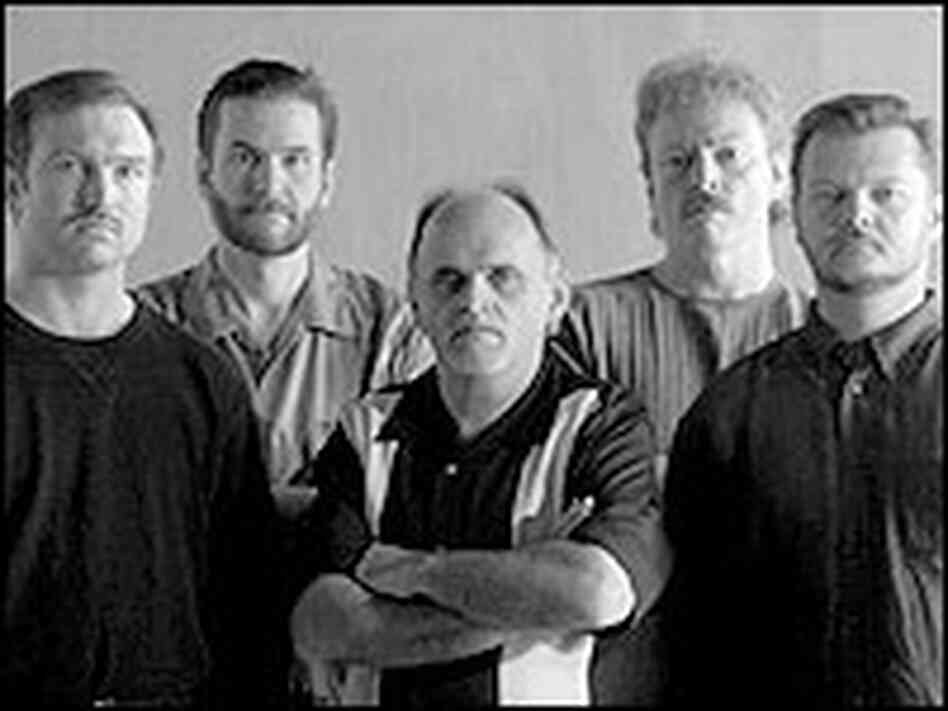 Members of Blue Highway in a black-and-white photo. Members of Blue Highway in a black-and-white photo.