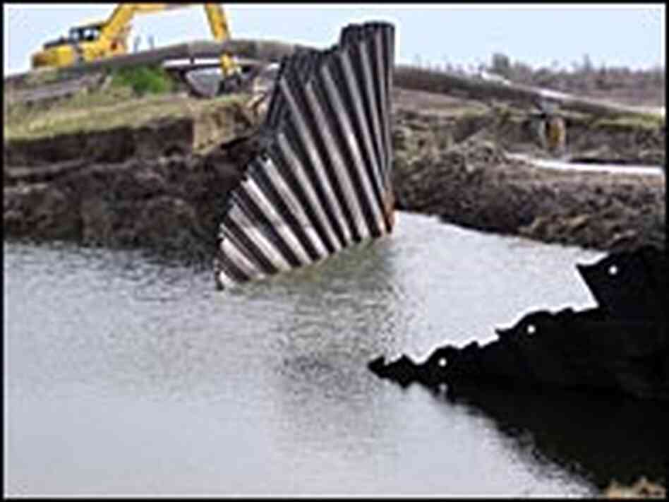 Steel levees crumpled, too. Steel levees crumpled, too.