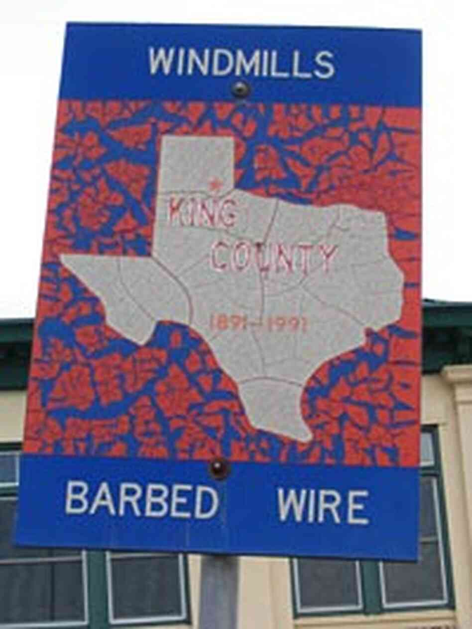 Windmills and barbed wire -- a sign outside the old King County Courthouse Windmills and barbed wire -- a sign outside the old King County Courthouse