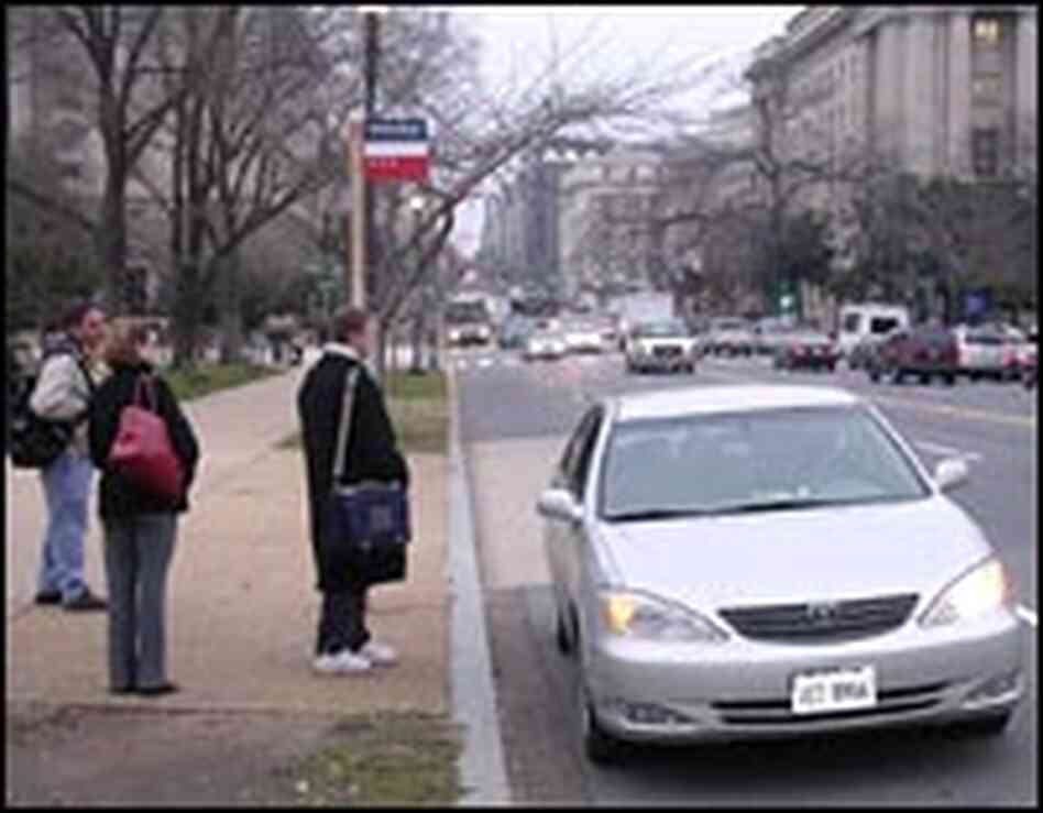 Carpoolers wait for a shared ride Carpoolers wait for a shared ride