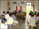 Worshipers gather in the house of a Christian evangelist in central China. Worshipers gather in the house of a Christian evangelist in central China.