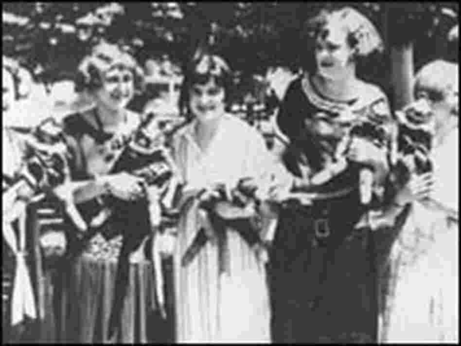 Girls from the Dayton area display monkey doll souvenirs at the courthouse. Girls from the Dayton area display monkey doll souvenirs at the courthouse.