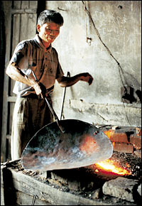 Black Smith makes a Wok