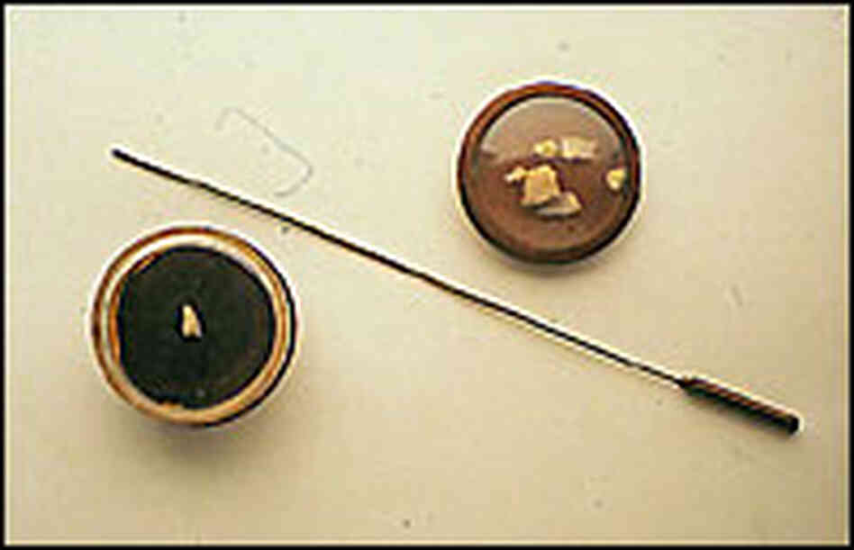 Probe used by doctor to remove the bullet from Lincoln's skull and skull fragments Probe used by doctor to remove the bullet from Lincoln's skull and skull fragments