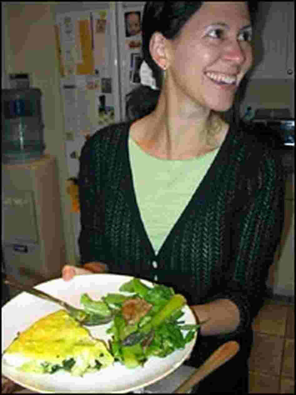 Melissa Block holds plate of frittata and a green salad topped with asparagus and grilled beef. Melissa Block holds plate of frittata and a green salad topped with asparagus and grilled beef.
