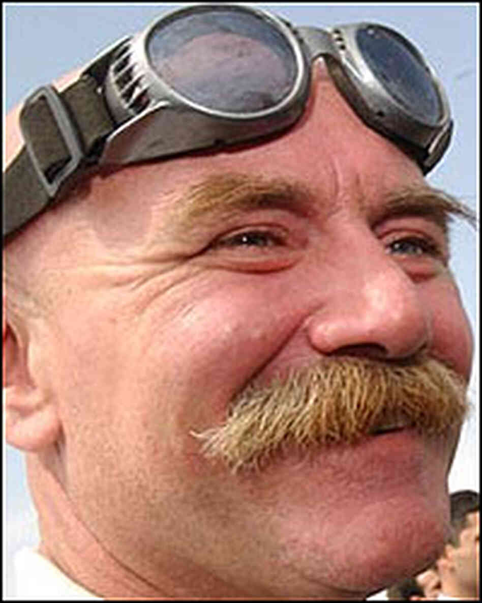 Thomas Goltz poses in motorcycle goggles. Thomas Goltz poses in motorcycle goggles.