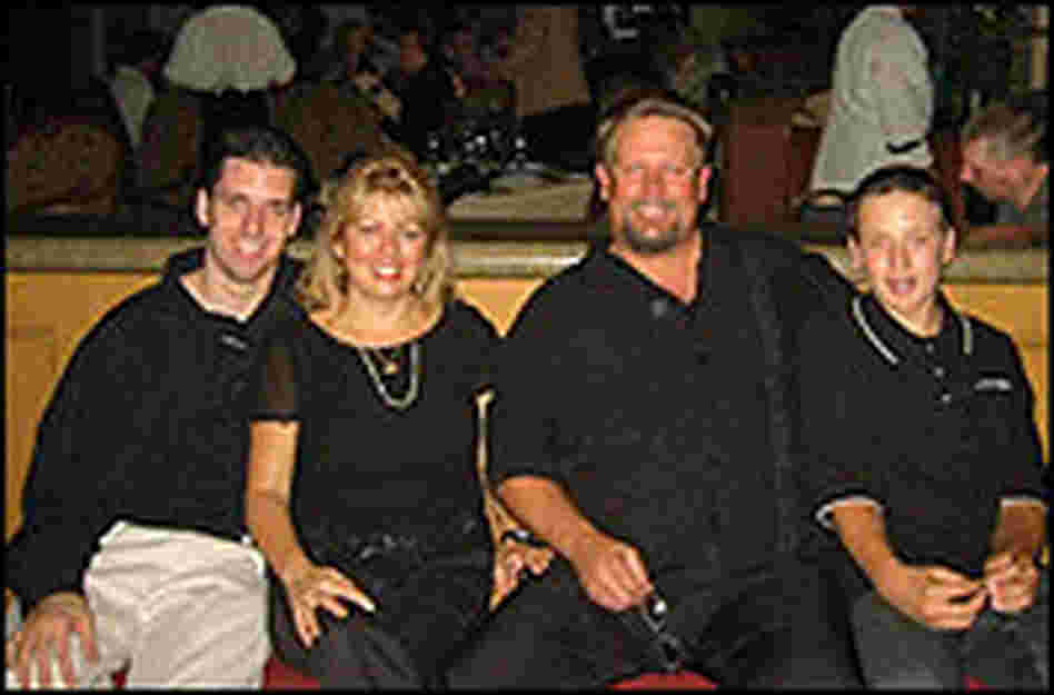 Matthew with his mother, Debbie, stepfather, Greg Smith, and younger brother, Travis.  