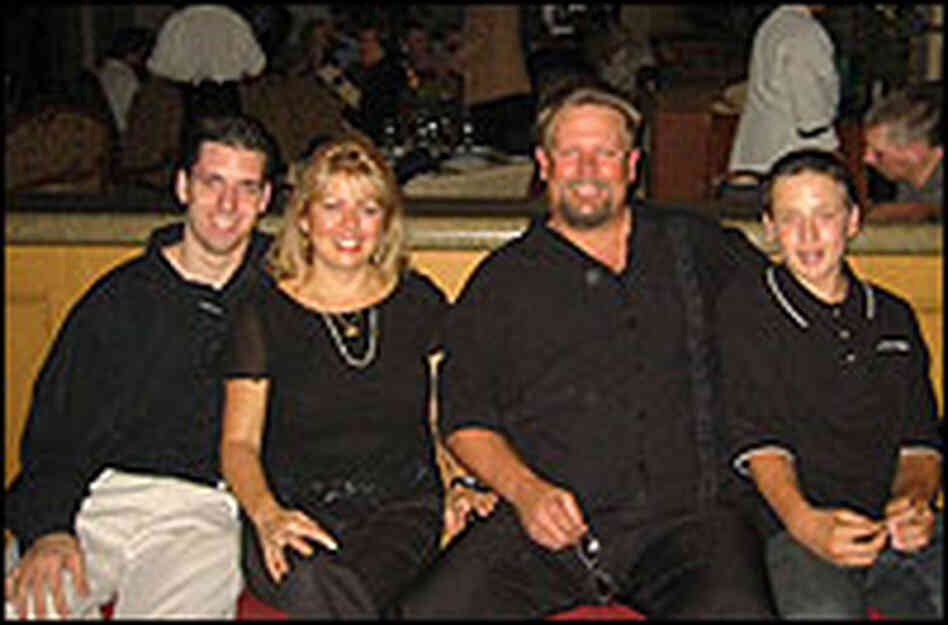 Matthew with his mother, Debbie, stepfather, Greg Smith, and younger brother, Travis.  