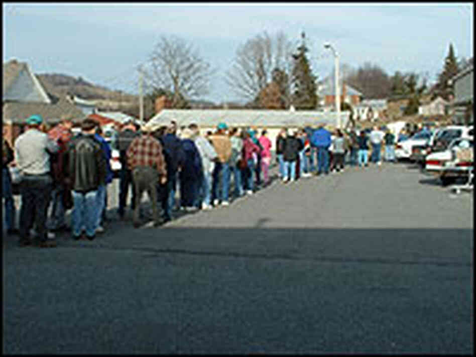 Waiting in line for food at the Second Harvest Food Pantry in Akins, Va. Waiting in line for food at the Second Harvest Food Pantry in Akins, Va.