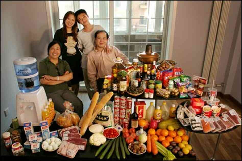 The Dong family in the living room of their one-bedroom apartment in Beijing. The Dong family in the living room of their one-bedroom apartment in Beijing.