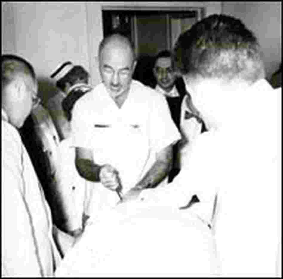 Dr. Walter Freeman operating on a patient, c. 1950. Dr. Walter Freeman operating on a patient, c. 1950.