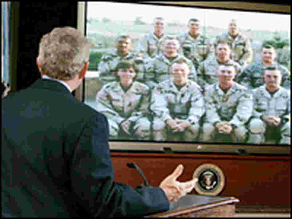 President Bush spoke with members of the 42nd Infantry Division National Guard unit in Iraq. President Bush spoke with members of the 42nd Infantry Division National Guard unit in Iraq.
