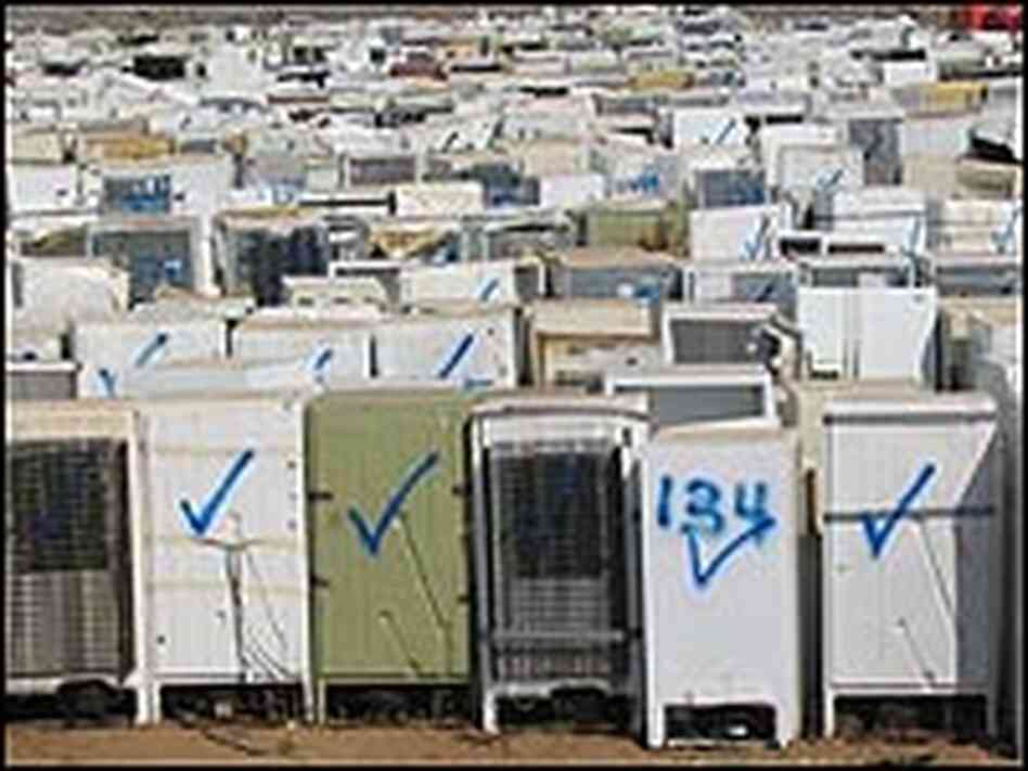 Row after row of refrigerators at a landfill in Jefferson Parish, La.