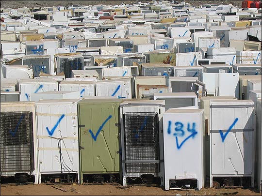 Row after row of refrigerators at a landfill in Jefferson Parish, La.