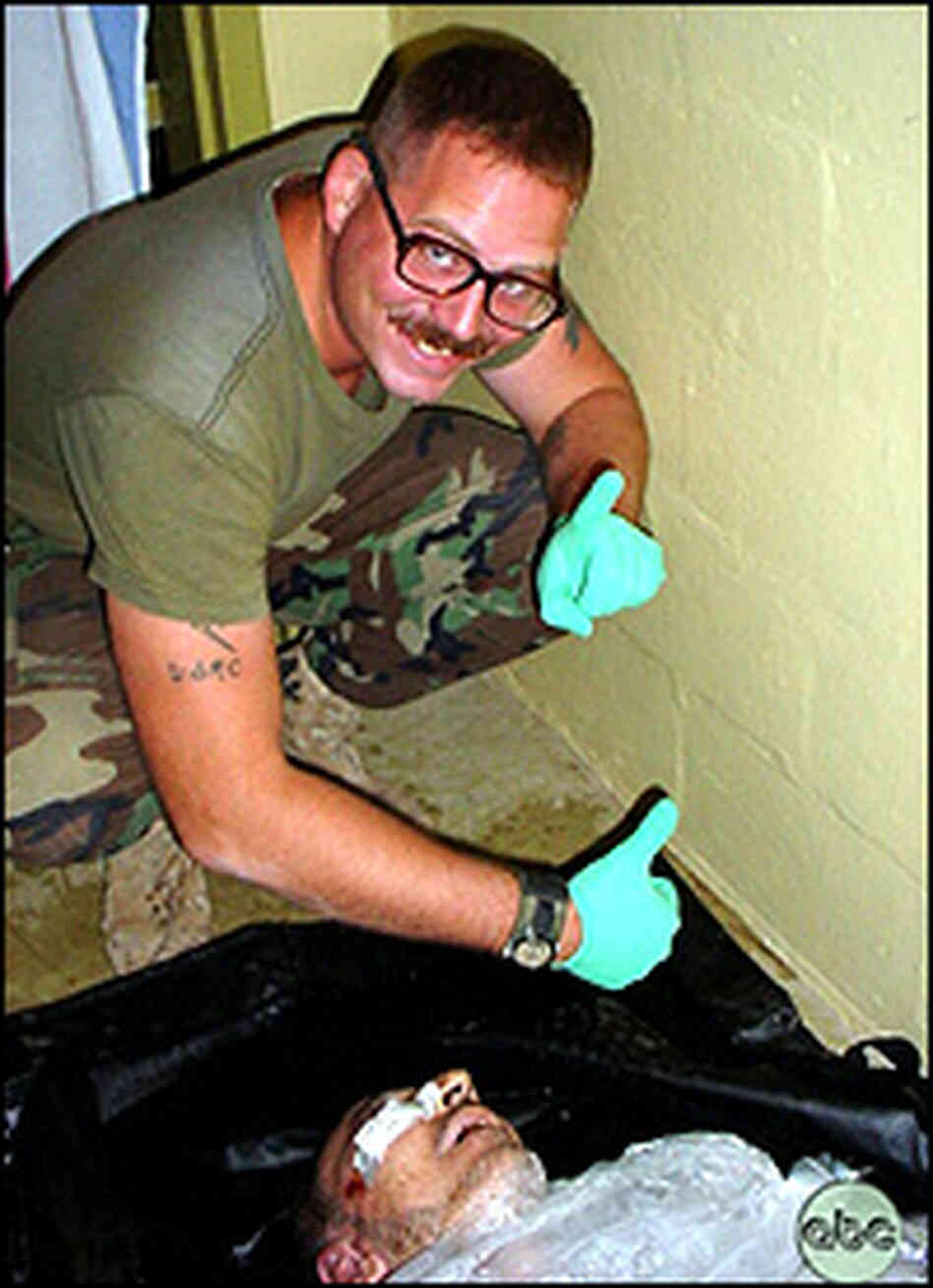 Sgt. Charles Graner poses over the body of detainee Manadel a-Jamadi in Abu Ghraib prison. Sgt. Charles Graner poses over the body of detainee Manadel a-Jamadi in Abu Ghraib prison.