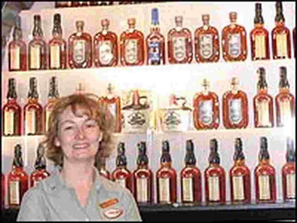 Lynn Grant stands in front of a wide variety of potent potables. Lynn Grant stands in front of a wide variety of potent potables.