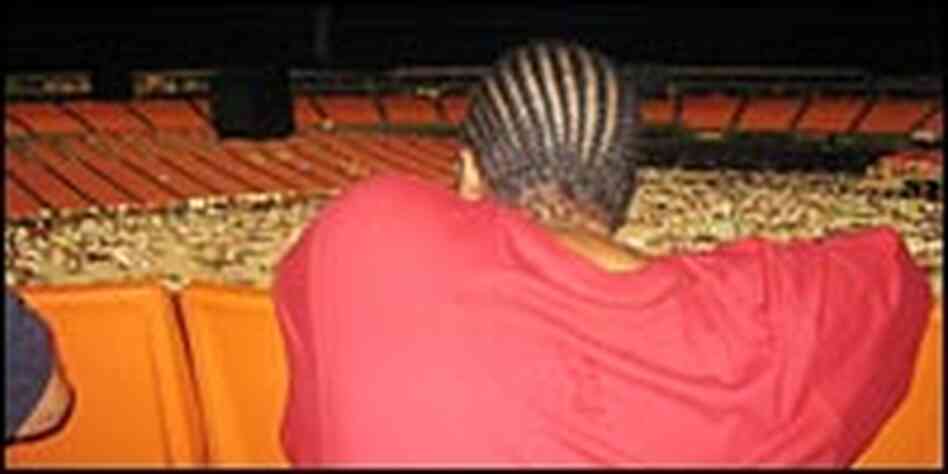 Deon Coleman scans the Astrodome for her son. Deon Coleman scans the Astrodome for her son.