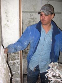 Stephen Louis Dehasa guts a house on Honeysuckle Lane. 