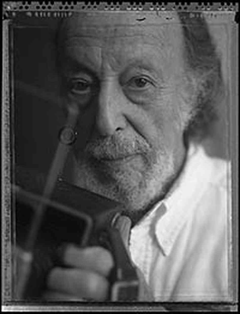 Herman Leonard, photographed with his camera by Greg Miles. Herman Leonard, photographed with his camera by Greg Miles.
