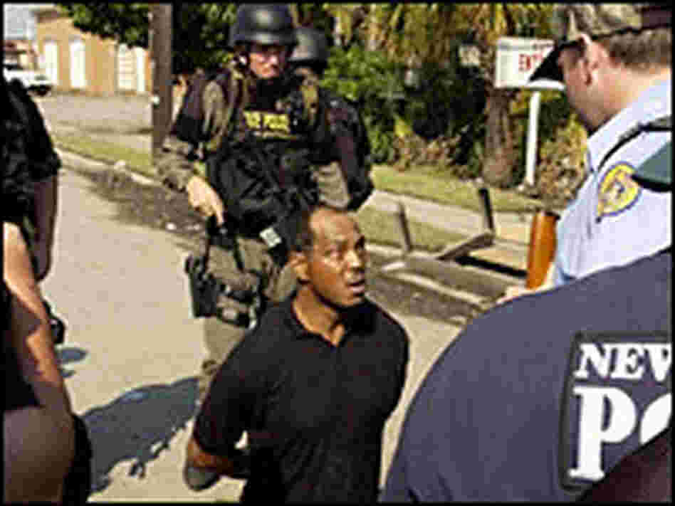 Lance Madison being arrested by Louisiana State Police on Sept. 4, 2005.