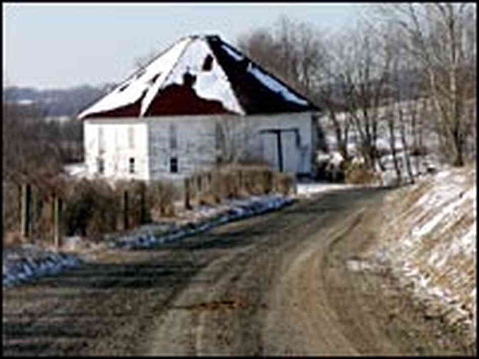 A barn sits along an empty rural road in Harrison County. A barn sits along an empty rural road in Harrison County.