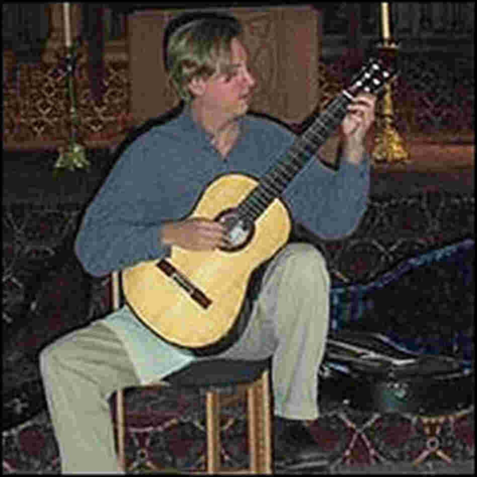 Playing guitar at St. Stanislaus is Jason Vieaux Playing guitar at St. Stanislaus is Jason Vieaux