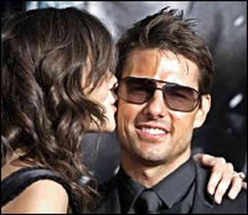 Cruise gets a kiss from girlfriend Katie Holmes Cruise gets a kiss from girlfriend Katie Holmes