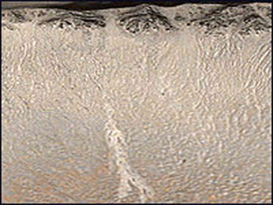 Images taken by the Mars Global Surveyor show recent changes in the wall of a Martian crater.