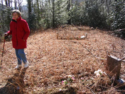 Peggy Medford explores an old graveyard on land her family once owned. 
