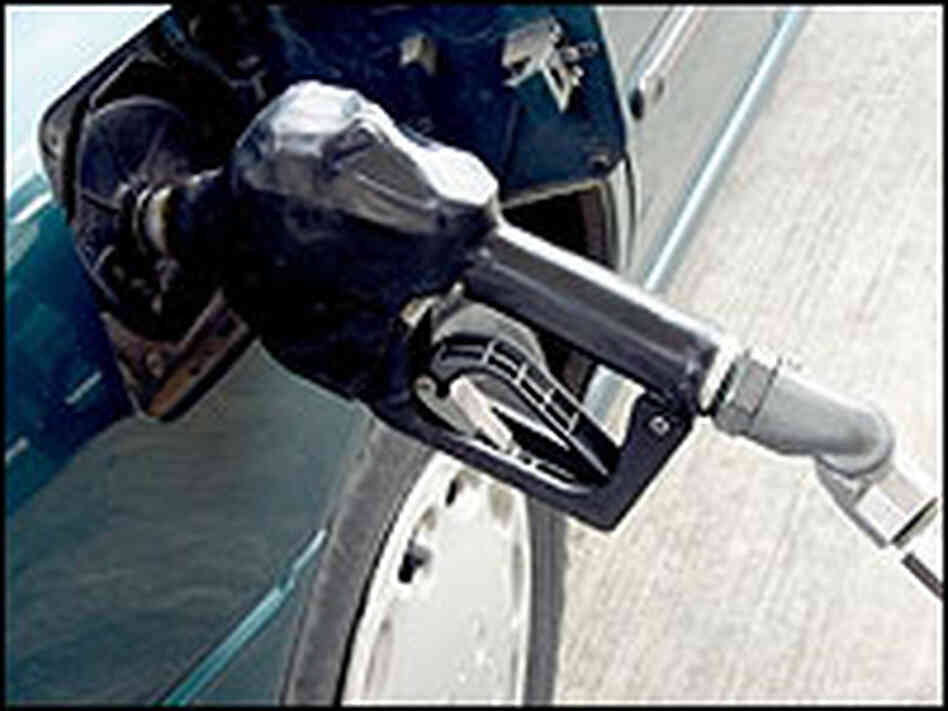 A car fuels up with an ethanol-gasoline blend. A car fuels up with an ethanol-gasoline blend.