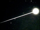 Stardust's return capsule as it heads for a landing on Earth.