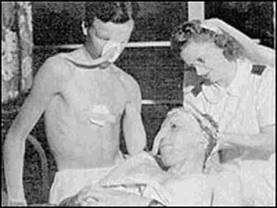  Bill Foxley (standing) in the second stage of his skin graft.