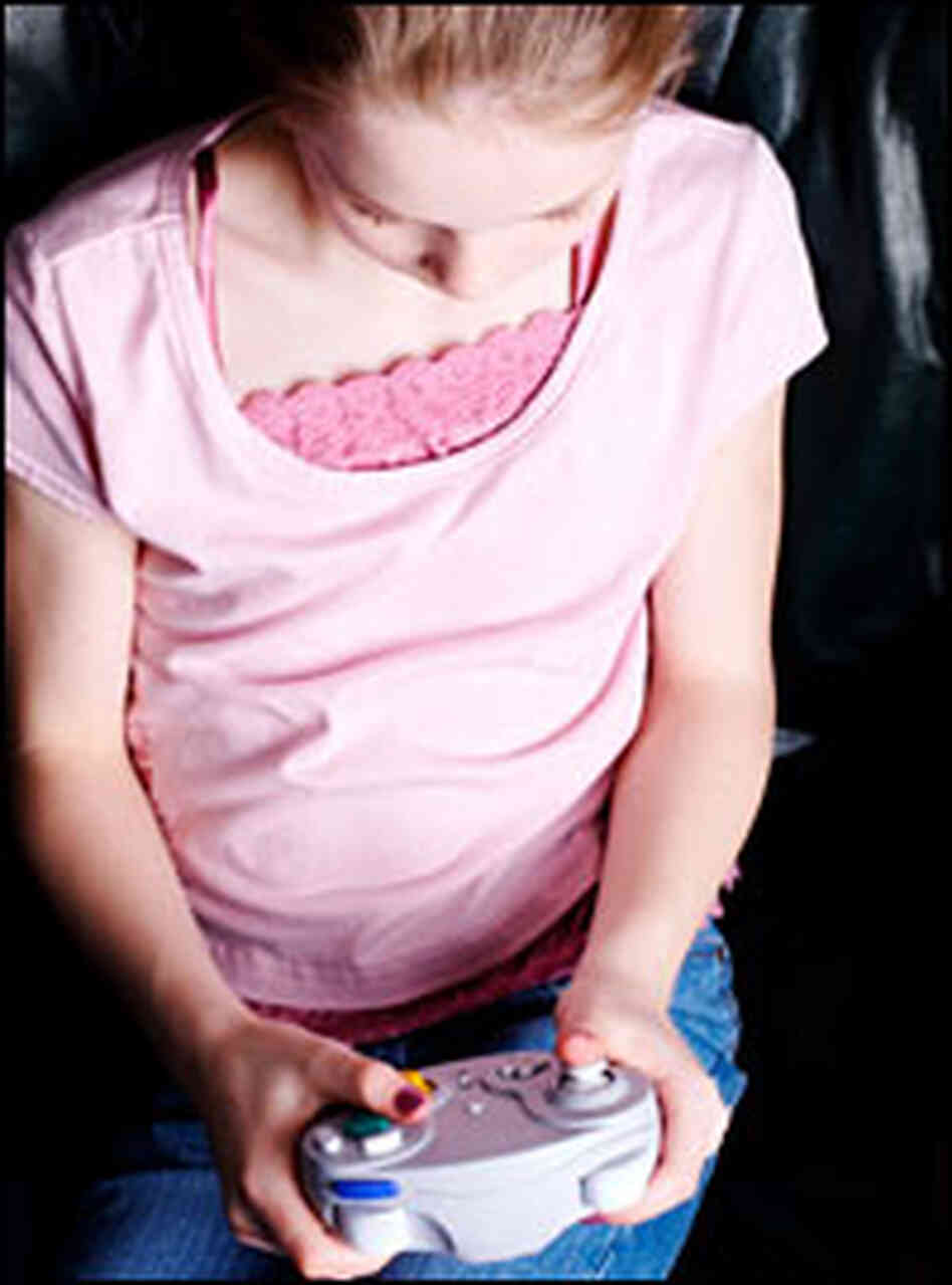 Girl playing video game Girl playing video game