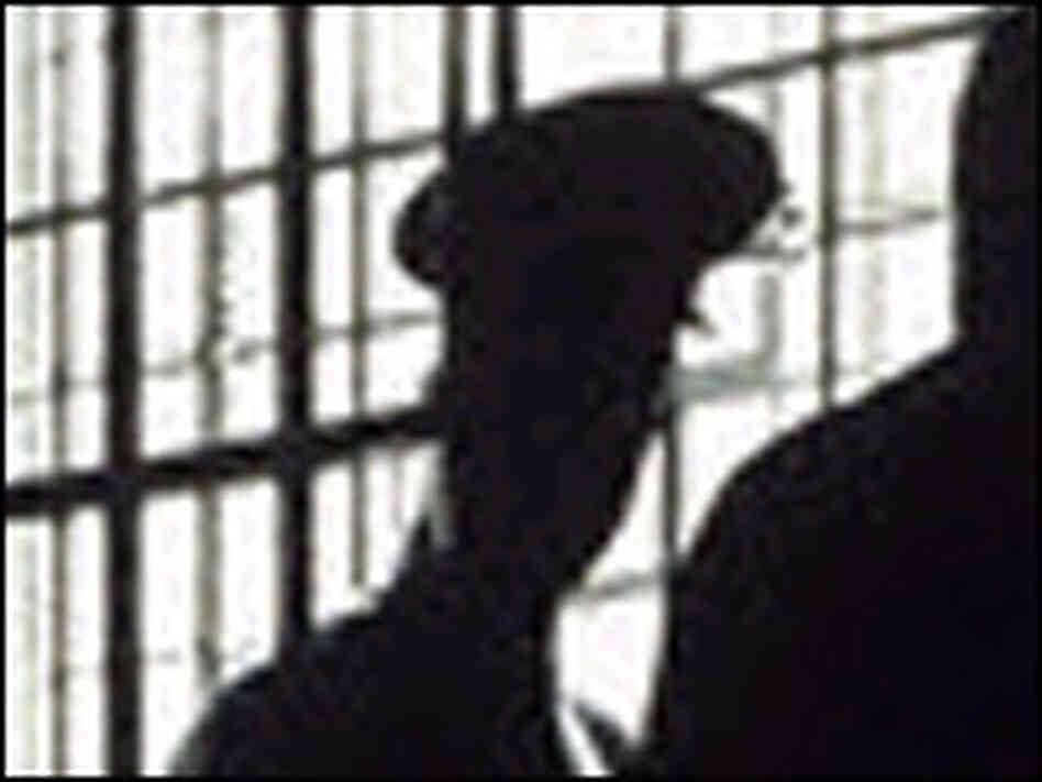 Stock photo of prison guard and prisoner. Stock photo of prison guard and prisoner.