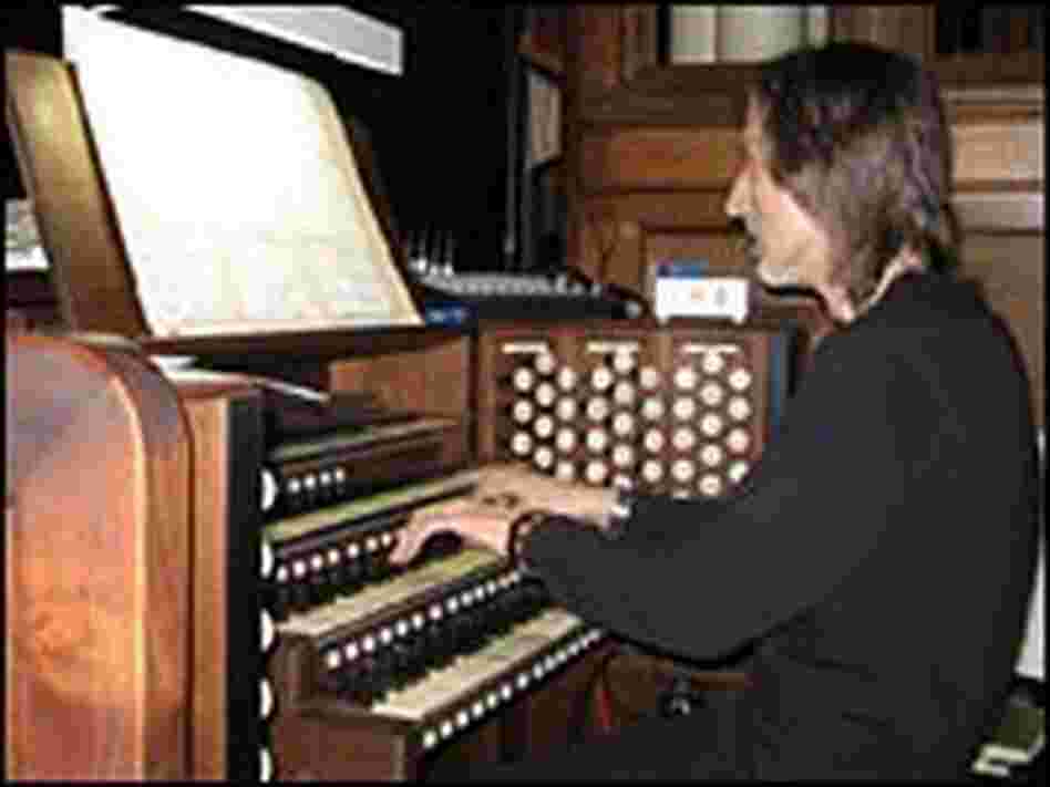 Albinas Prizgintas plays the organ at the Trinity Episcopal Church. Albinas Prizgintas plays the organ at the Trinity Episcopal Church.