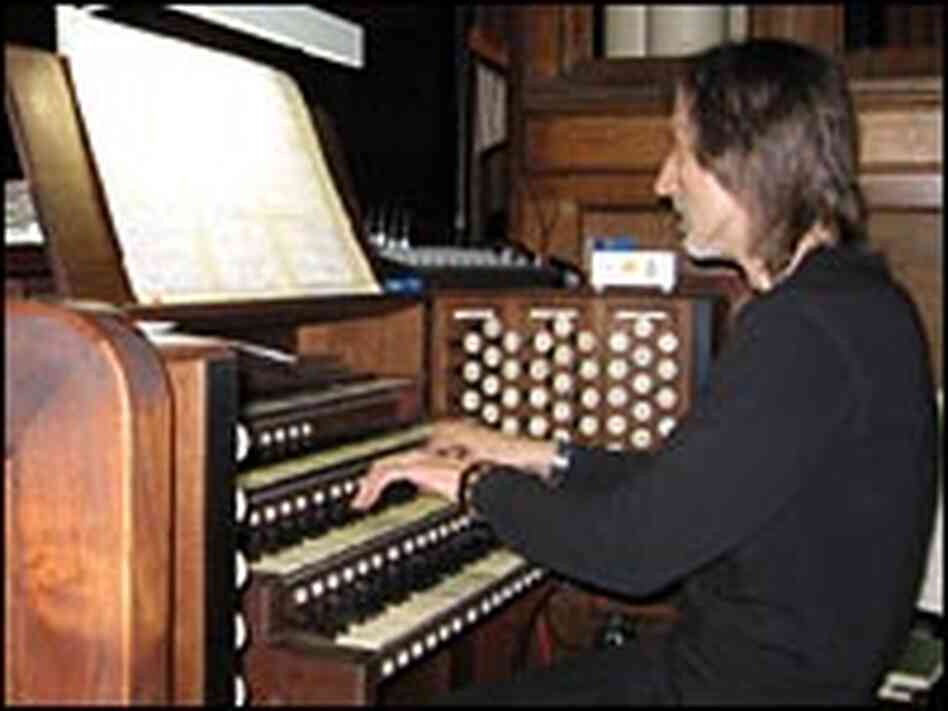 Albinas Prizgintas plays the organ at the Trinity Episcopal Church. Albinas Prizgintas plays the organ at the Trinity Episcopal Church.