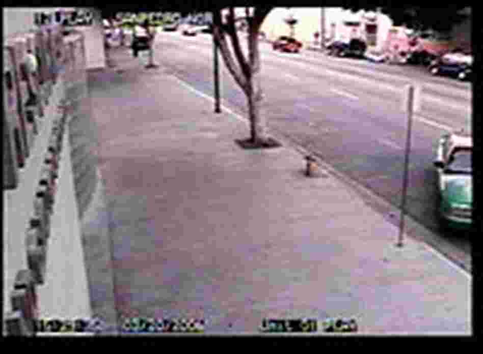 A taxi cab pulls a u-turn to the entrance to the Union Rescue Mission. A taxi cab pulls a u-turn to the entrance to the Union Rescue Mission.