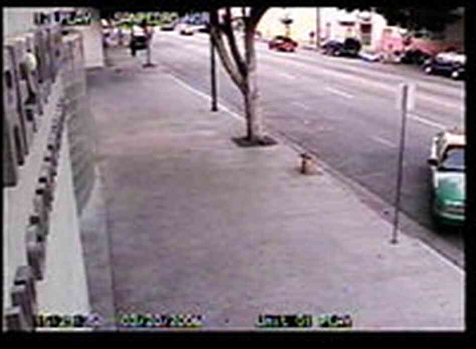 A taxi cab pulls a u-turn to the entrance to the Union Rescue Mission. A taxi cab pulls a u-turn to the entrance to the Union Rescue Mission.