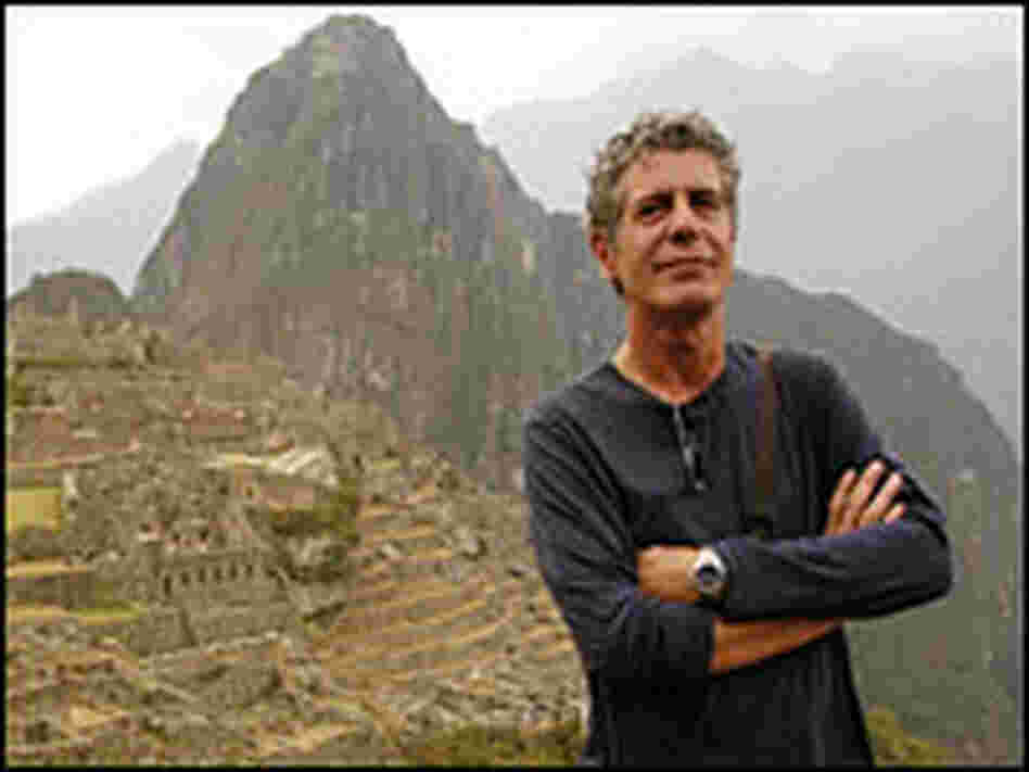 Chef, author and TV show host Anthony Bourdain at the Incan ruins of Machu Picchu