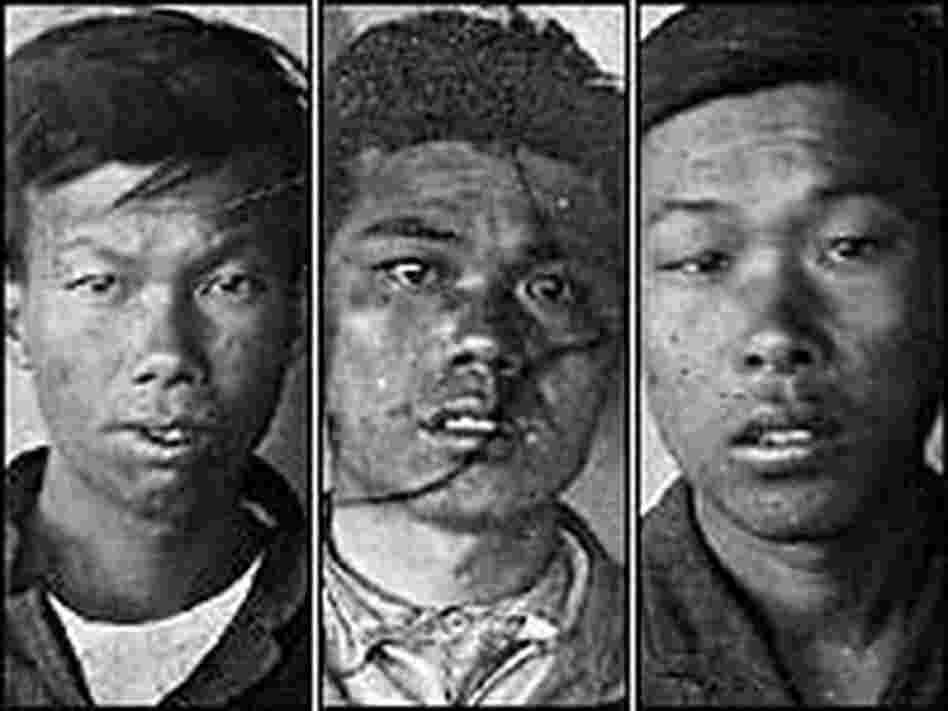 Mug shots of three Chinese immigrants captured in a sting on smuggling across the U.S.-Mexico border Mug shots of three Chinese immigrants captured in a sting on smuggling across the U.S.-Mexico border