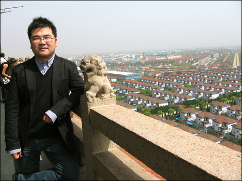 Huaxi resident Wu Hao, 26, runs an import-export business. Note the Dolce and Gabbana sunglasses. 