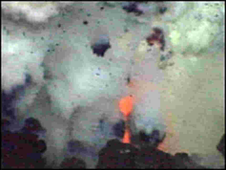 Glowing red lava jets out of the  "Brimstone Pit" crater.