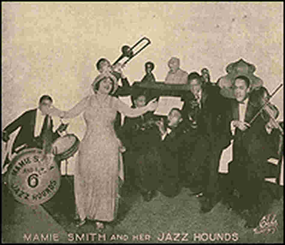 A detail from a 1920s record cover shows Mamie Smith and members of the Jazz Hounds.