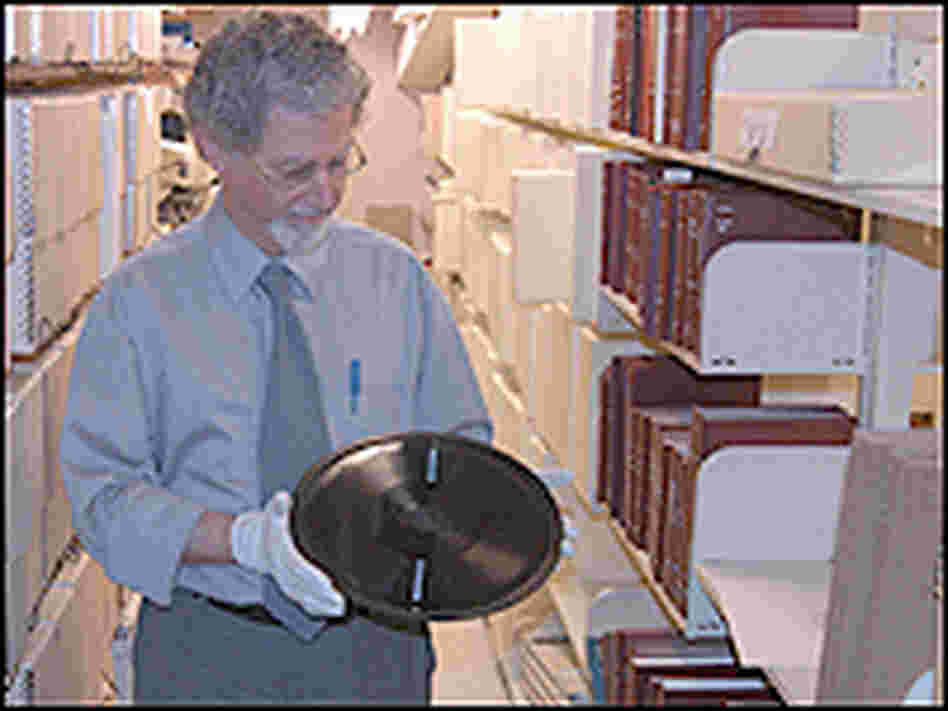 Michael Taft with a vinyl disc in the Library of Congress archives. Michael Taft with a vinyl disc in the Library of Congress archives.
