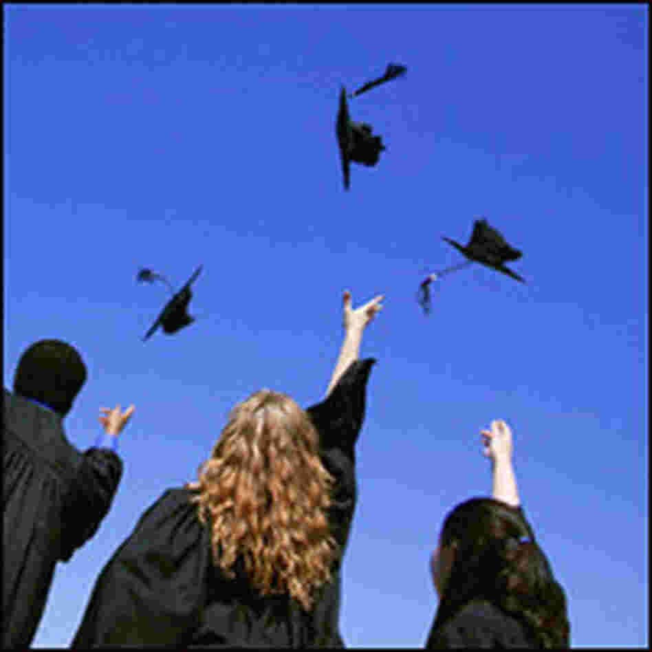 Students celebrate their graduation Students celebrate their graduation